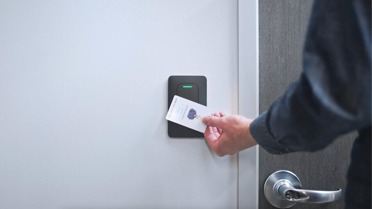 Using a security key-card to access an entry point of a building.